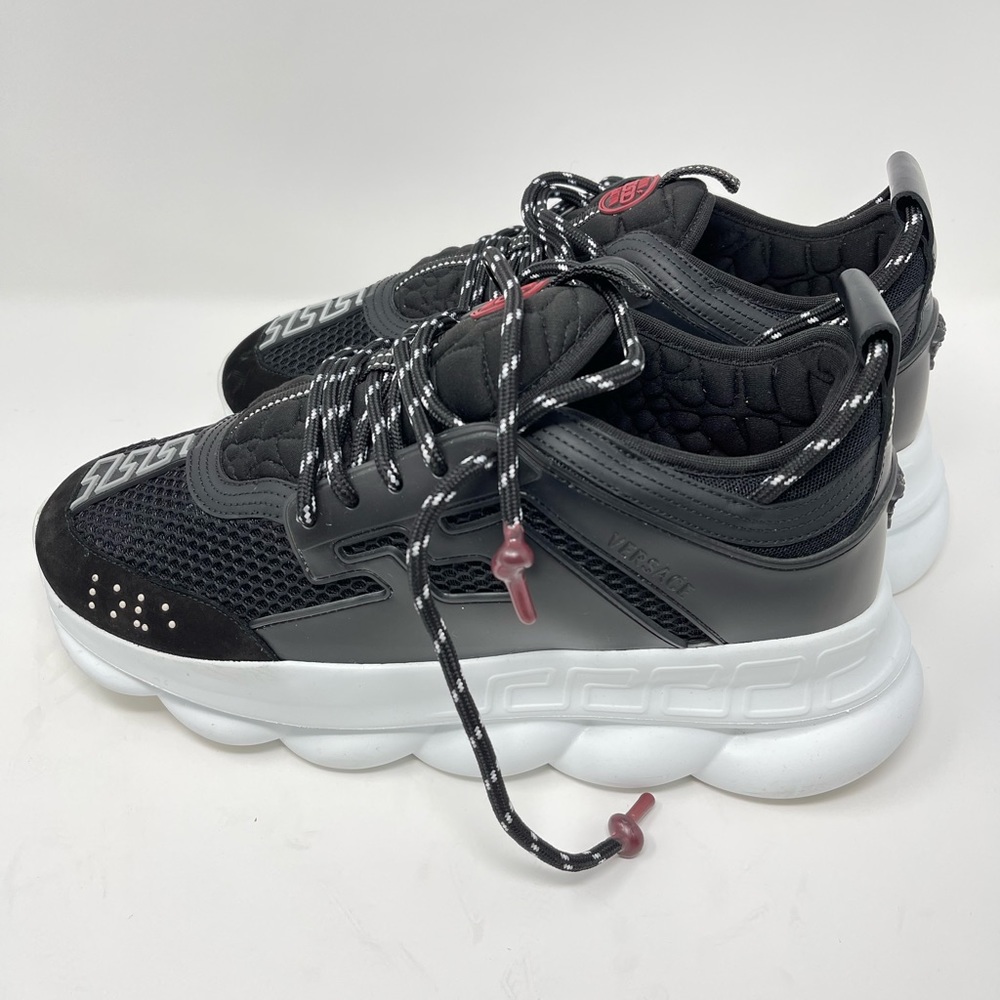 Used but in excellent condition Versace Chain Reaction sz 45=12